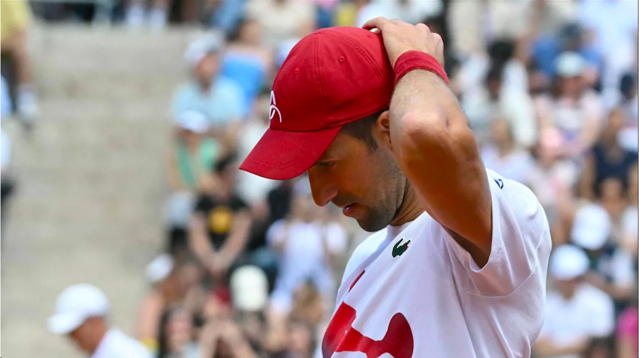 'Fine' Djokovic dons cycling crash helmet after Rome bottle drama