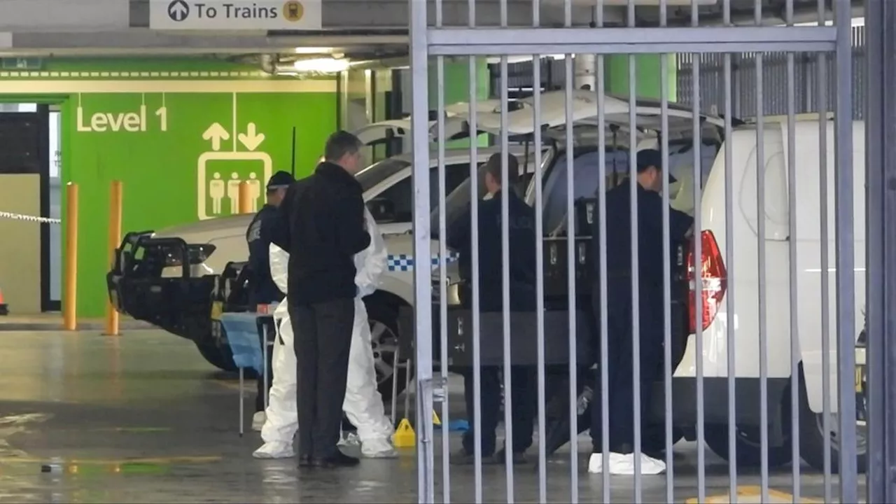 Man charged with murder after body found in stairwell at Wollongong railway station carpark