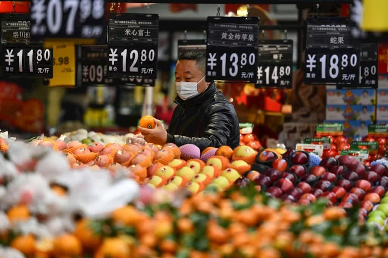 Asian markets mixed as traders pause ahead of US inflation data