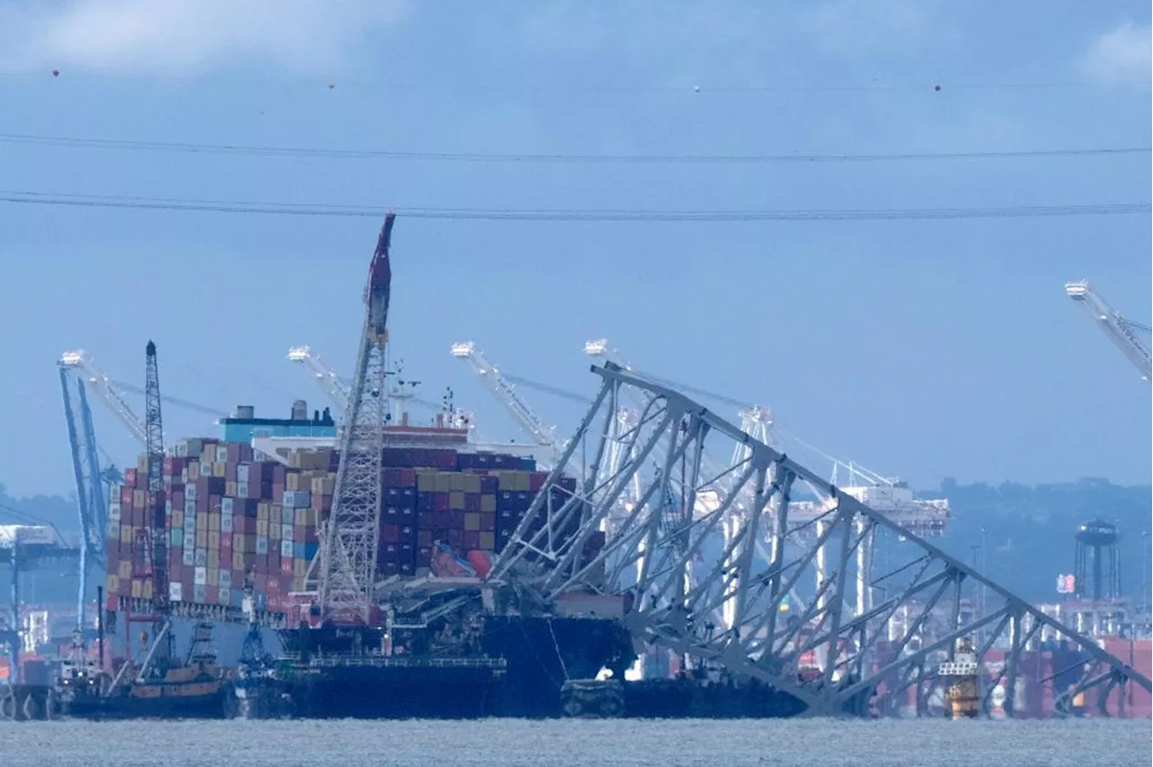 Crews conduct controlled demolition on Baltimore bridge span as cleanup continues at collapse site