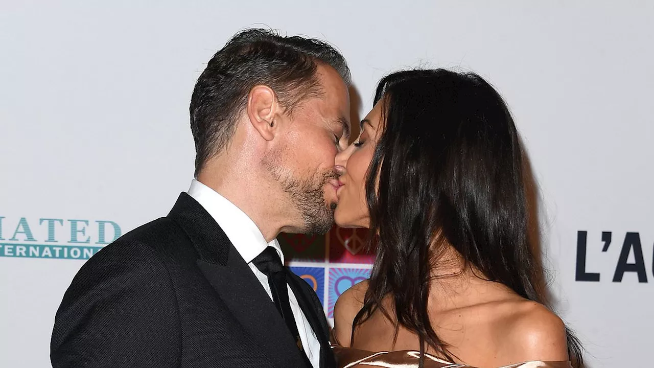 Ioan Gruffudd and Bianca Wallace share a kiss at the Race To Erase Multiple Sclerosis Gala