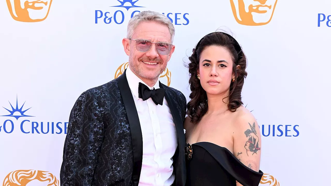 Martin Freeman, 51, makes a rare red carpet appearance with girlfriend Rachel Benaissa, 30, as they...