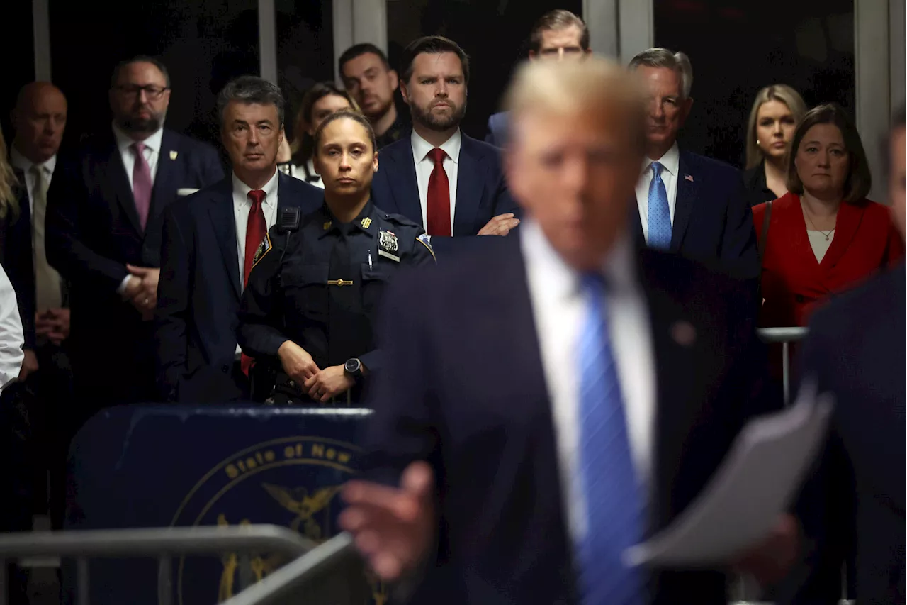 Trump allies Vance and Tuberville appear behind former president at New York courthouse