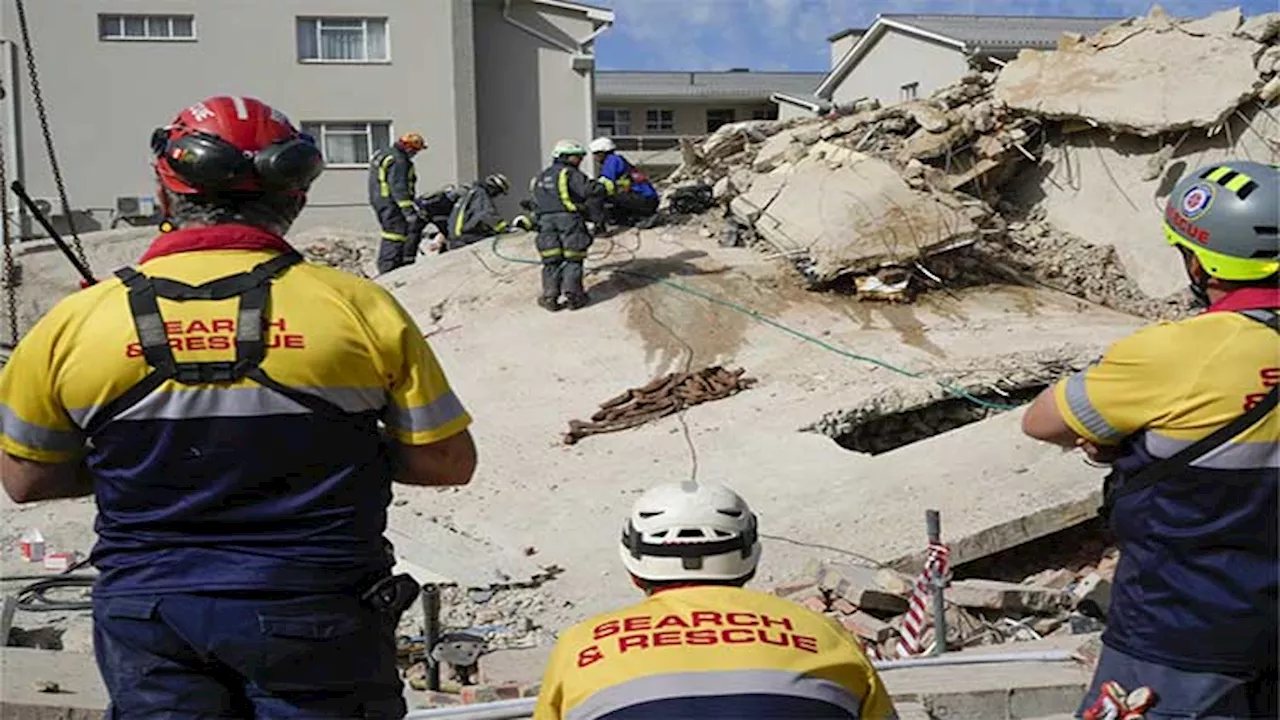 Rescue efforts for dozens missing in South Africa building collapse are boosted by 1 more survivor