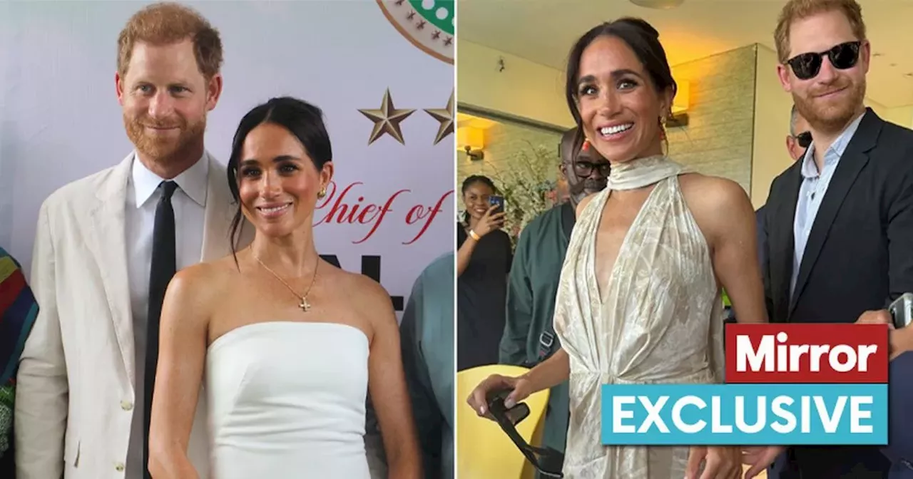 Prince Harry's 'awkward' moment as he tries to 'steer' Meghan Markle in Nigeria