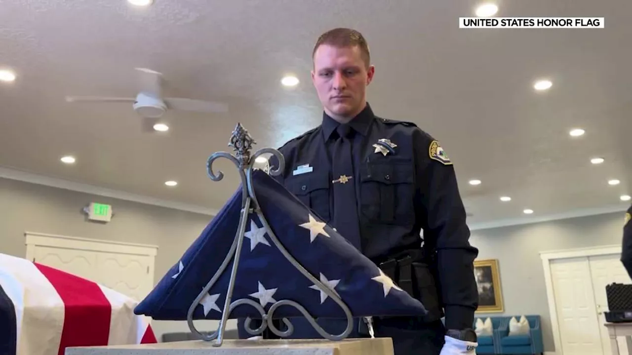 United States Honor Flag accompanies Santaquin Police Sgt. Bill Hooser during funeral