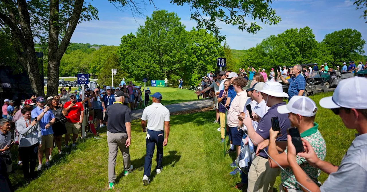 Tiger Woods draws massive crowd at PGA practice round