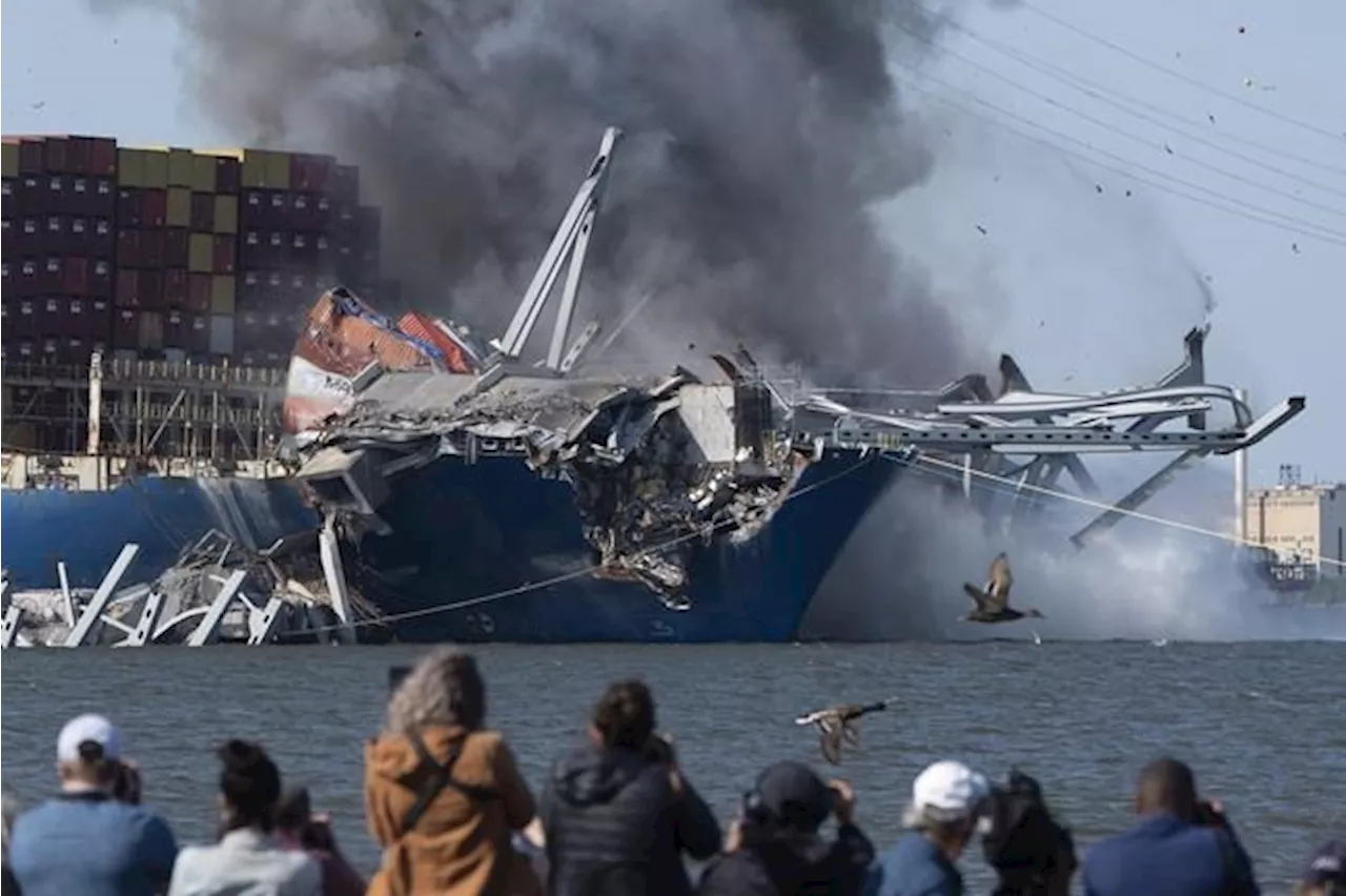 Crews conduct controlled demolition on Baltimore bridge span as cleanup continues at collapse site