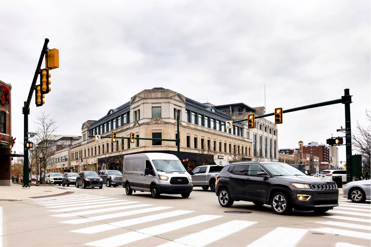 Red, yellow, green ... and white? Smarter vehicles could mean big changes for the traffic light