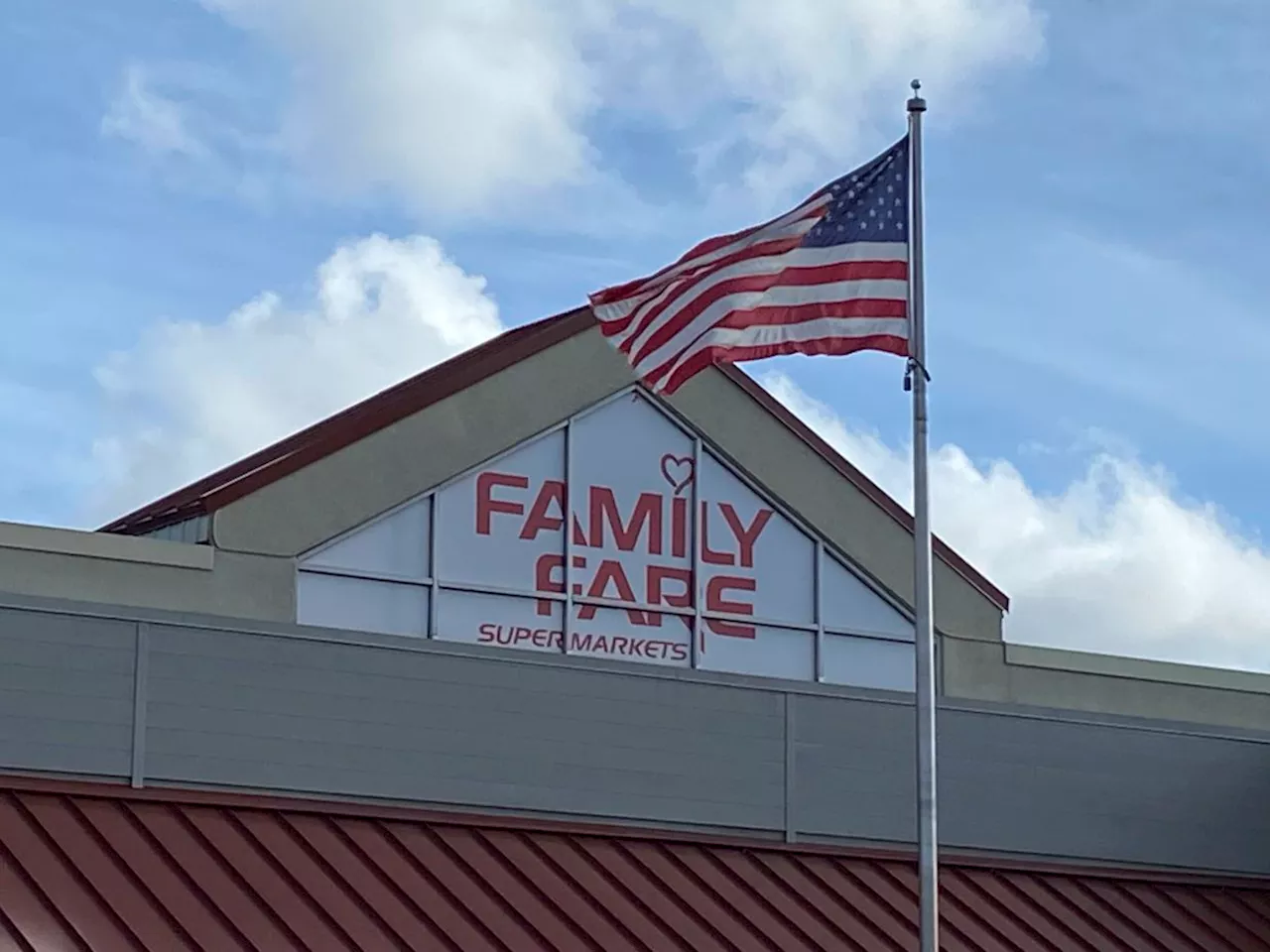 Woman was living inside rooftop grocery store sign with computer and coffee maker for a year