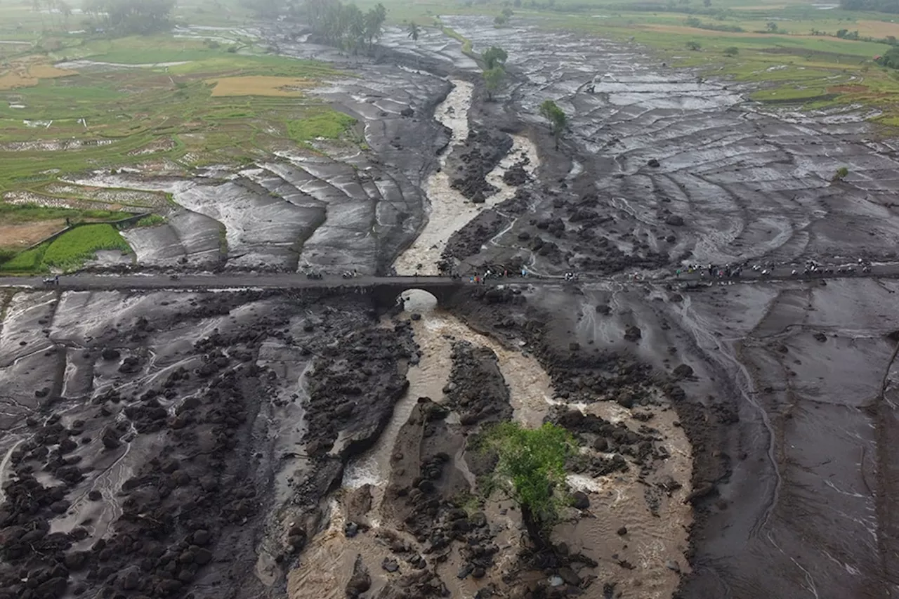 More bodies found in Indonesia after flash floods killed dozens and submerged homes