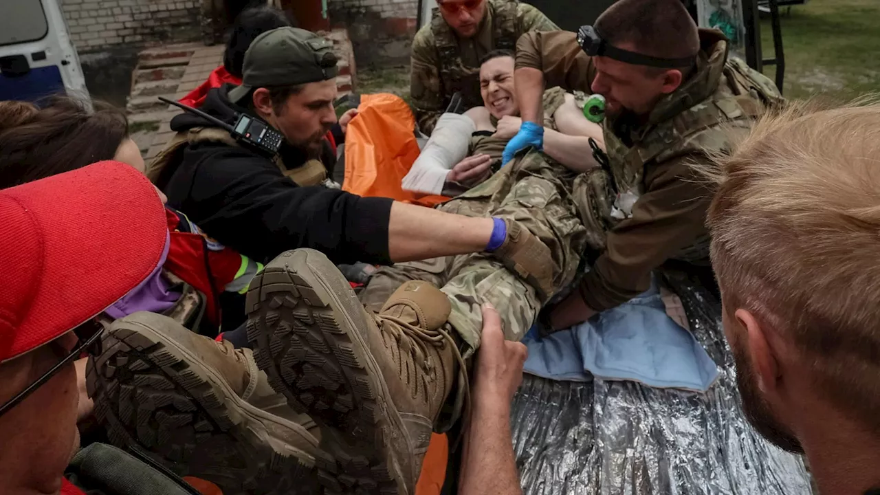 Ukraine troops fighting ‘fierce battles’ against Vlad’s invading forces in Kharkiv as thousands flee homes...