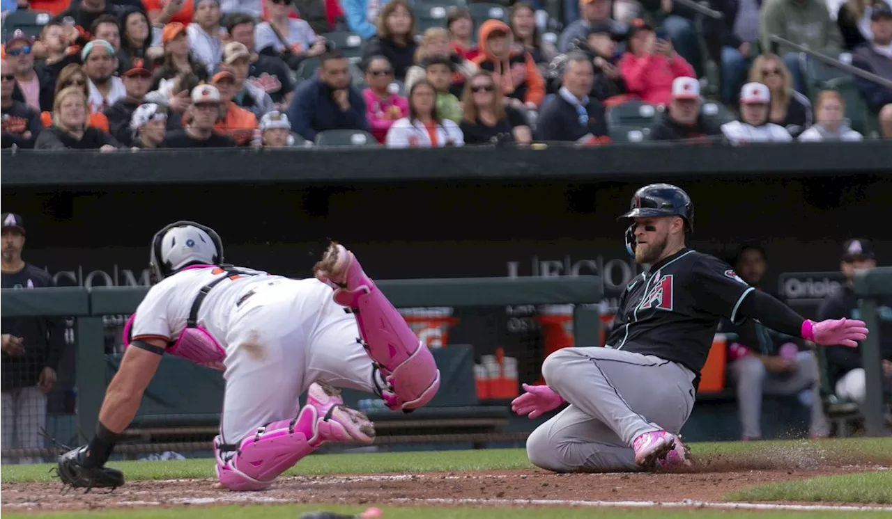 Orioles unusually sloppy as Diamondbacks avoid sweep