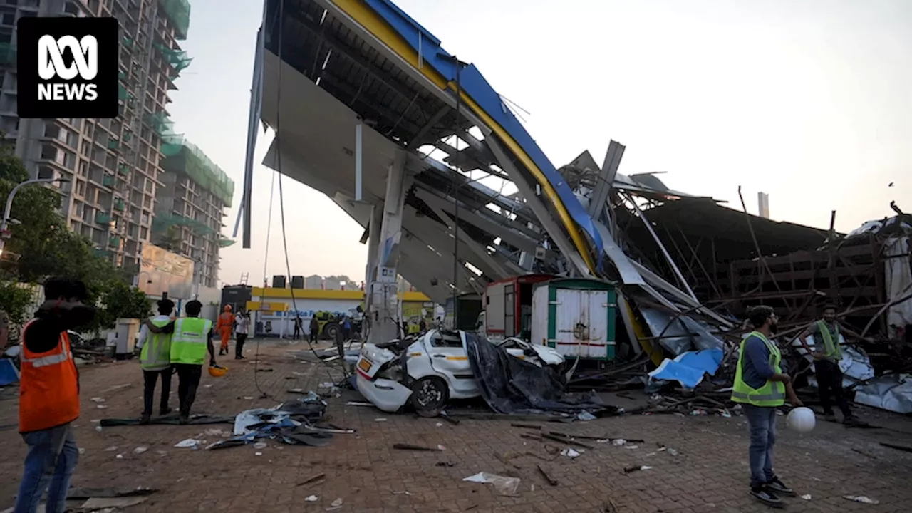 Fourteen dead, more than 70 injured after storm brings down massive Mumbai billboard