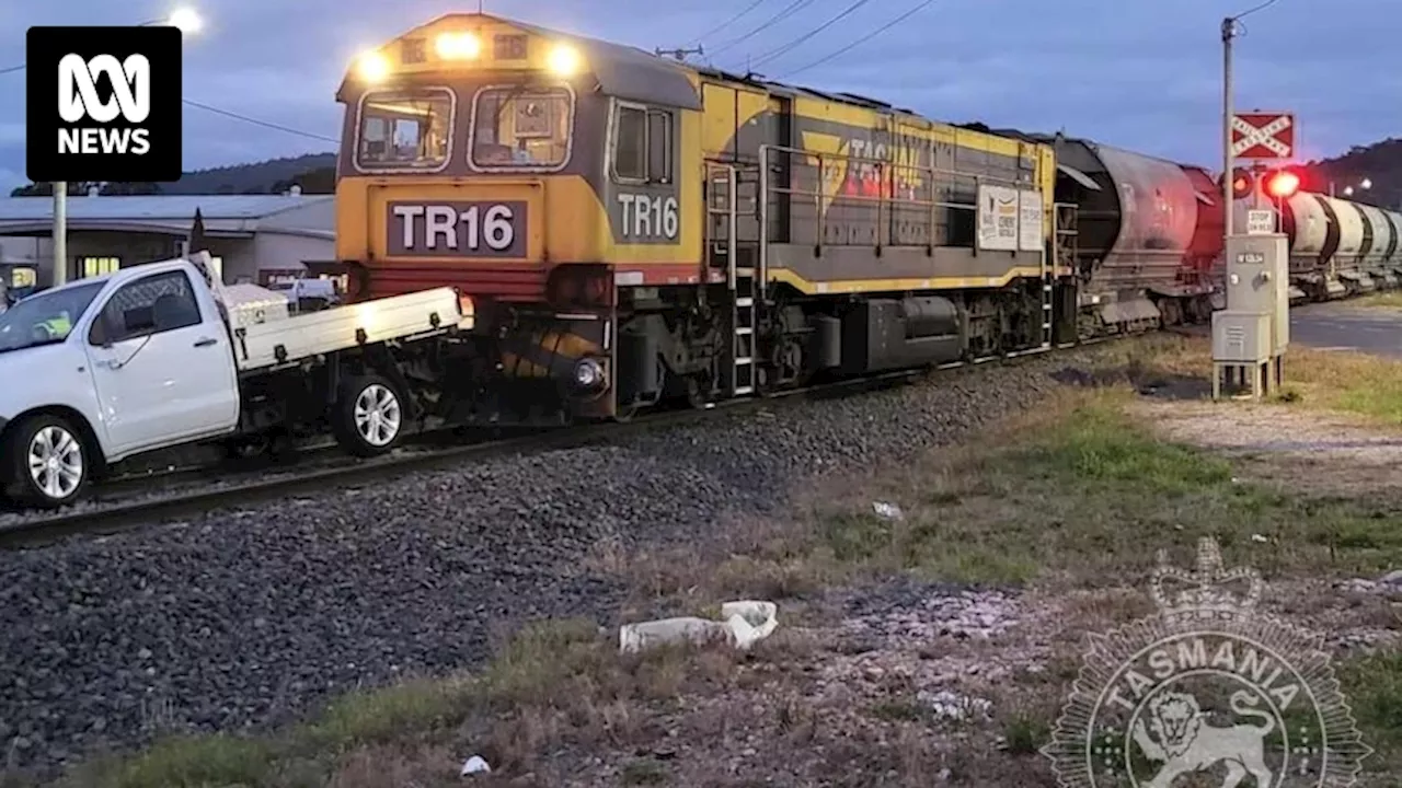 Man jumps free from car as train smashes into it at Devonport crossing in Tasmania's north-west