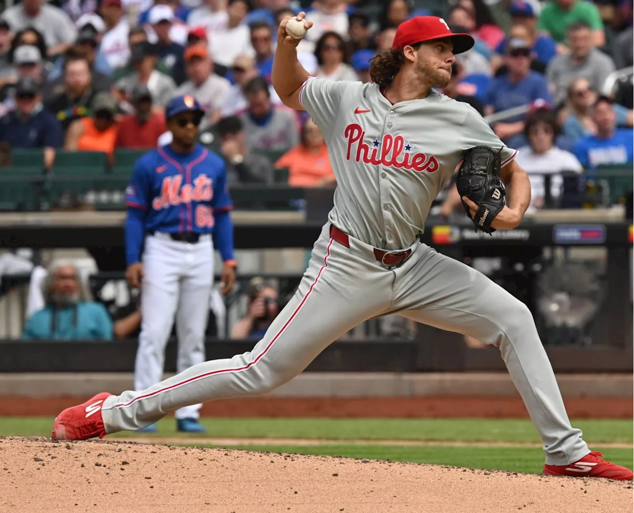 Nola throws complete-game 4-hitter, Phillies shutout Mets 4-0