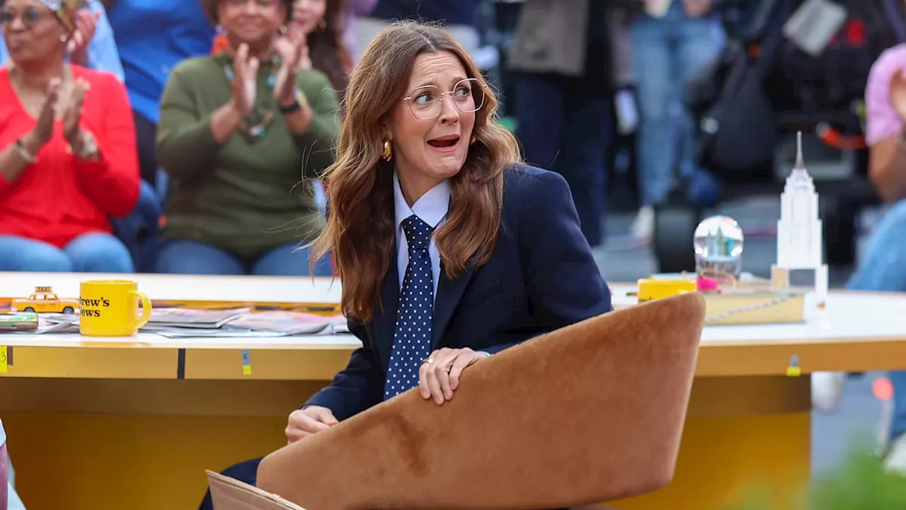 Drew Barrymore FALLS out of her chair in front of shocked audience