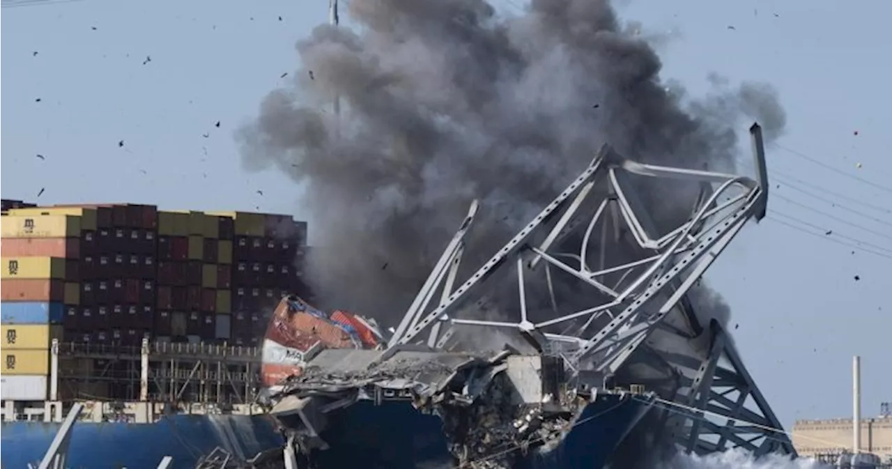 Collapsed Baltimore bridge span brought down with controlled explosion