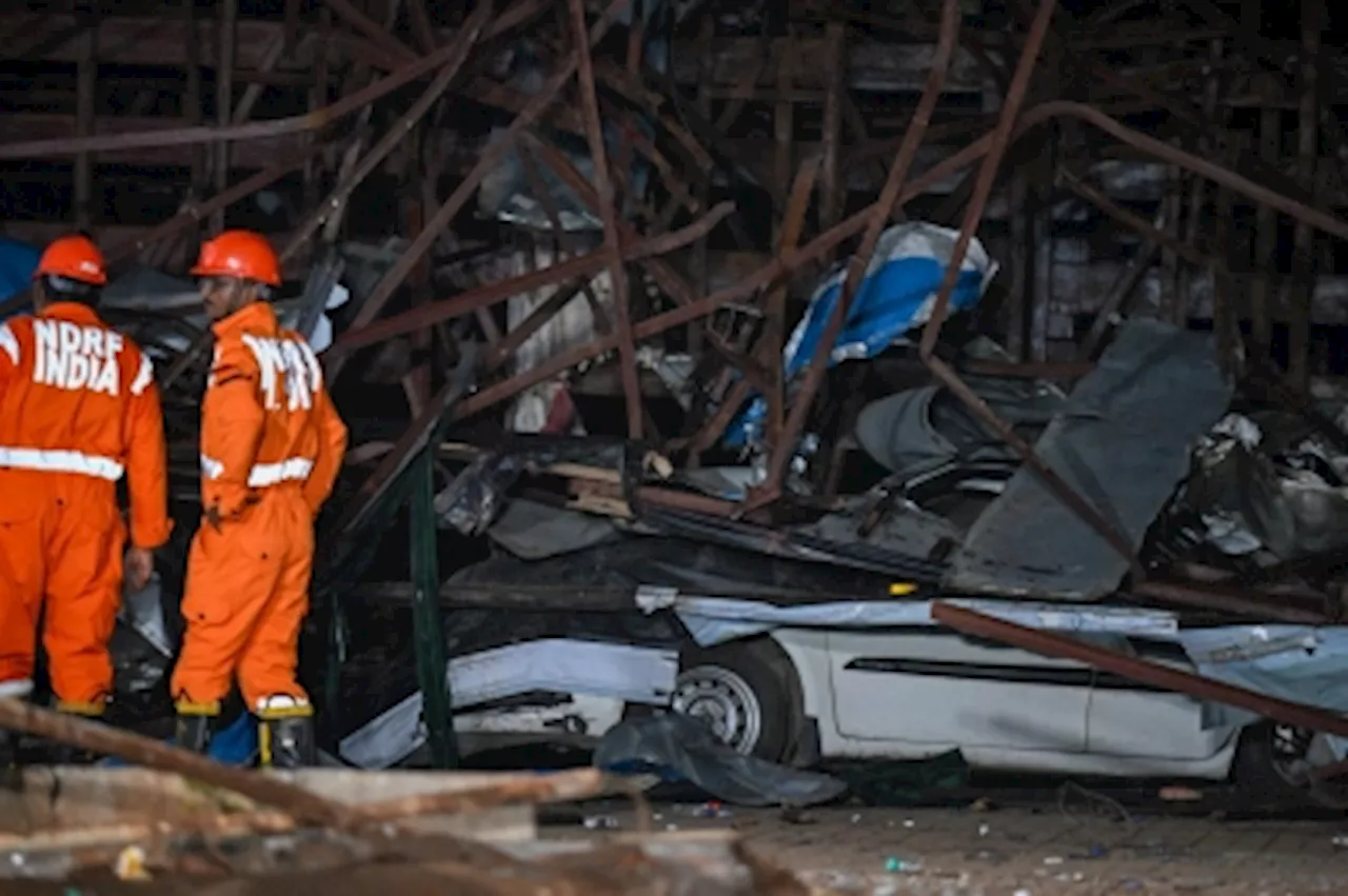 Twelve dead, 60 injured in India billboard collapse