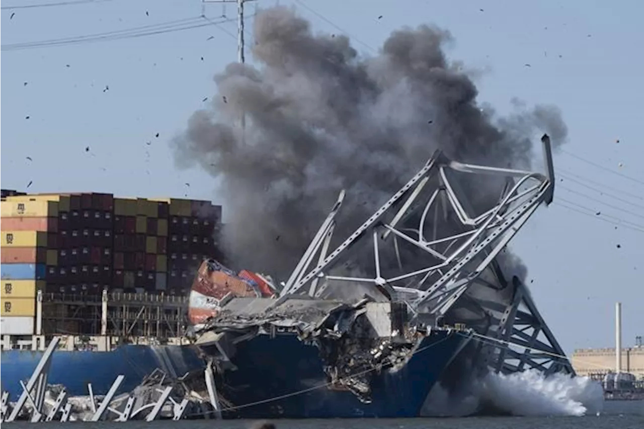 Crews conduct controlled demolition on Baltimore bridge span as cleanup continues at collapse site