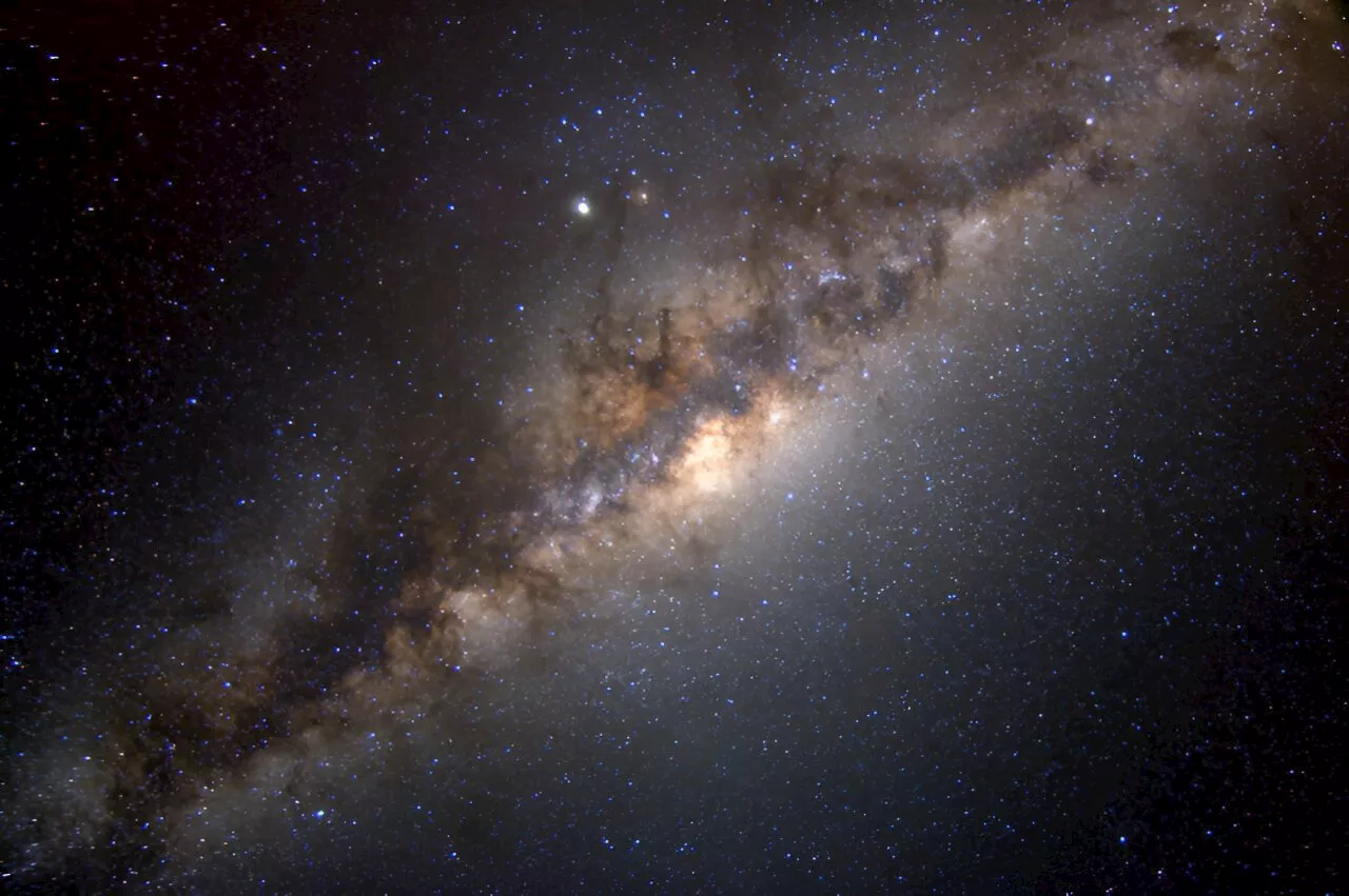 Three stars circling the Milky Way's halo formed 12 to 13 billion years ago