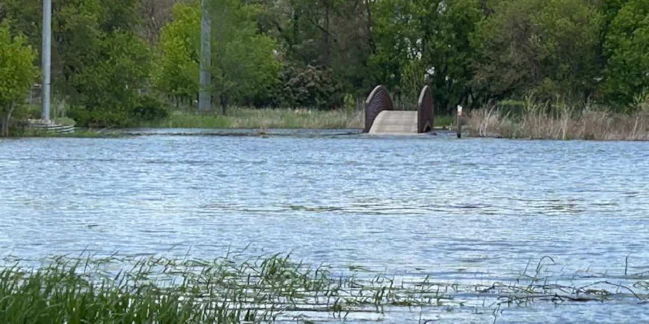 High school coach rescues 12-year-old boys trapped by floodwaters