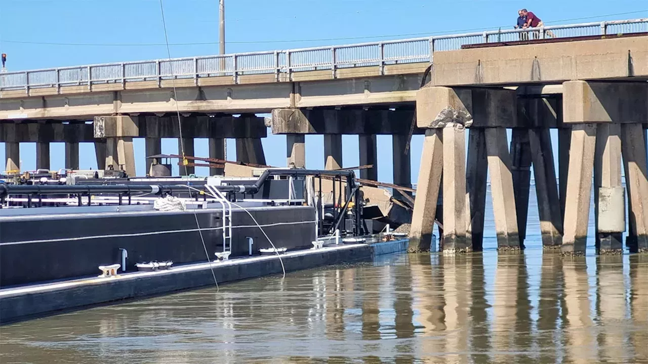 Barge Hits Bridge Barge hit Pelican Island Causeway, causing portion