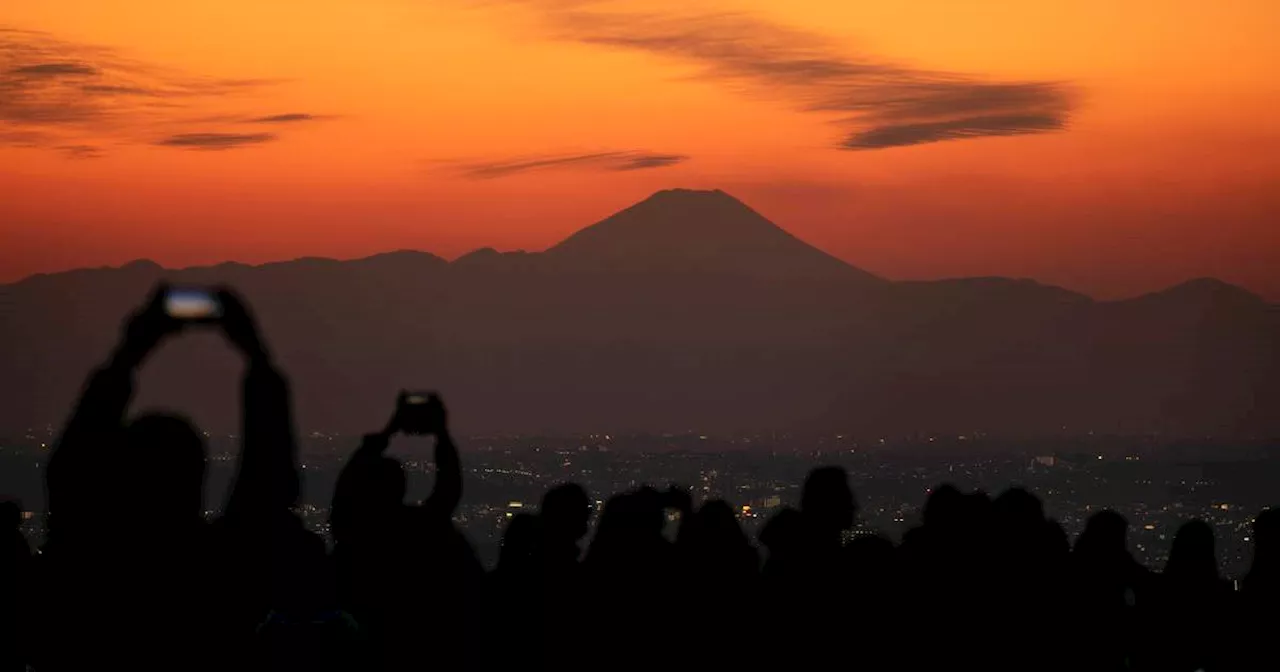 Japan, famously polite, struggles to cope with influx of tourists