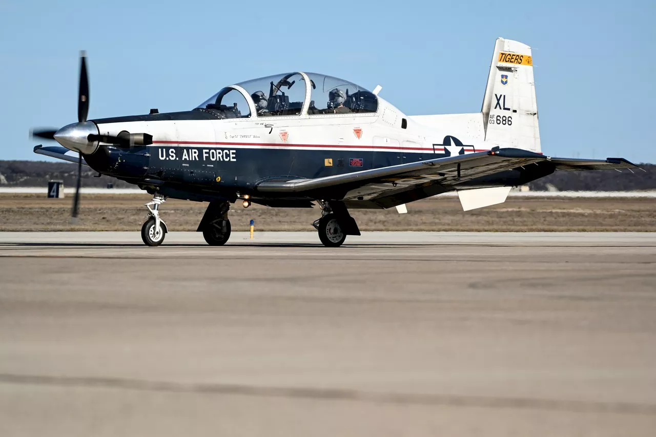 Air Force instructor pilot dies when ejection seat activates while plane on ground