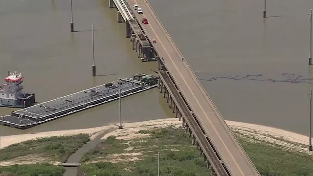 Barge hits bridge connecting Galveston and Pelican Island, causing oil ...