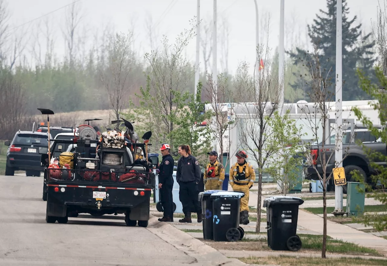 As wildfire approaches Fort McMurray, Alberta officials hope cooler temps, winds could push the blaze away