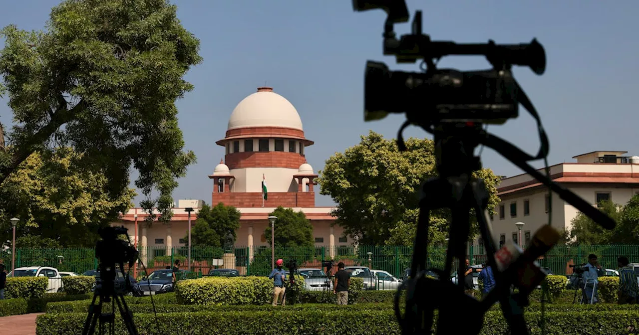 India's top court orders release of journalist held in illegal funding case