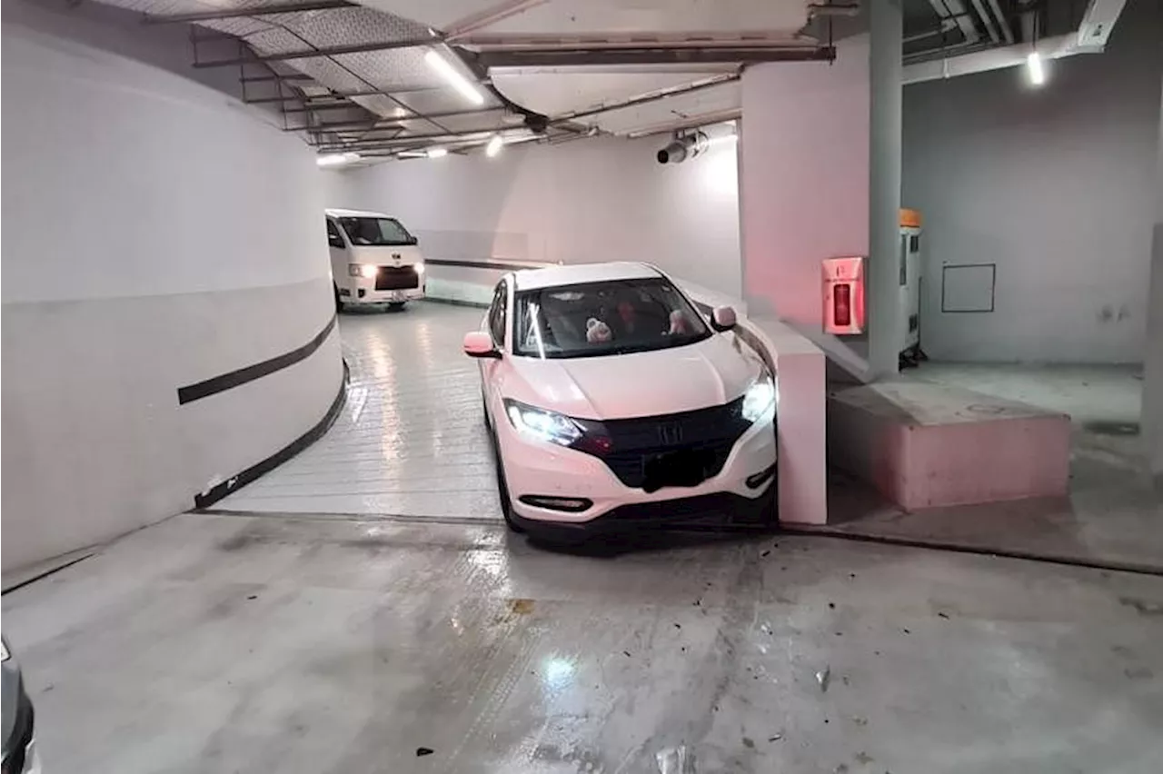 Cars slide and crash into Funan mall carpark wall during heavy downpour