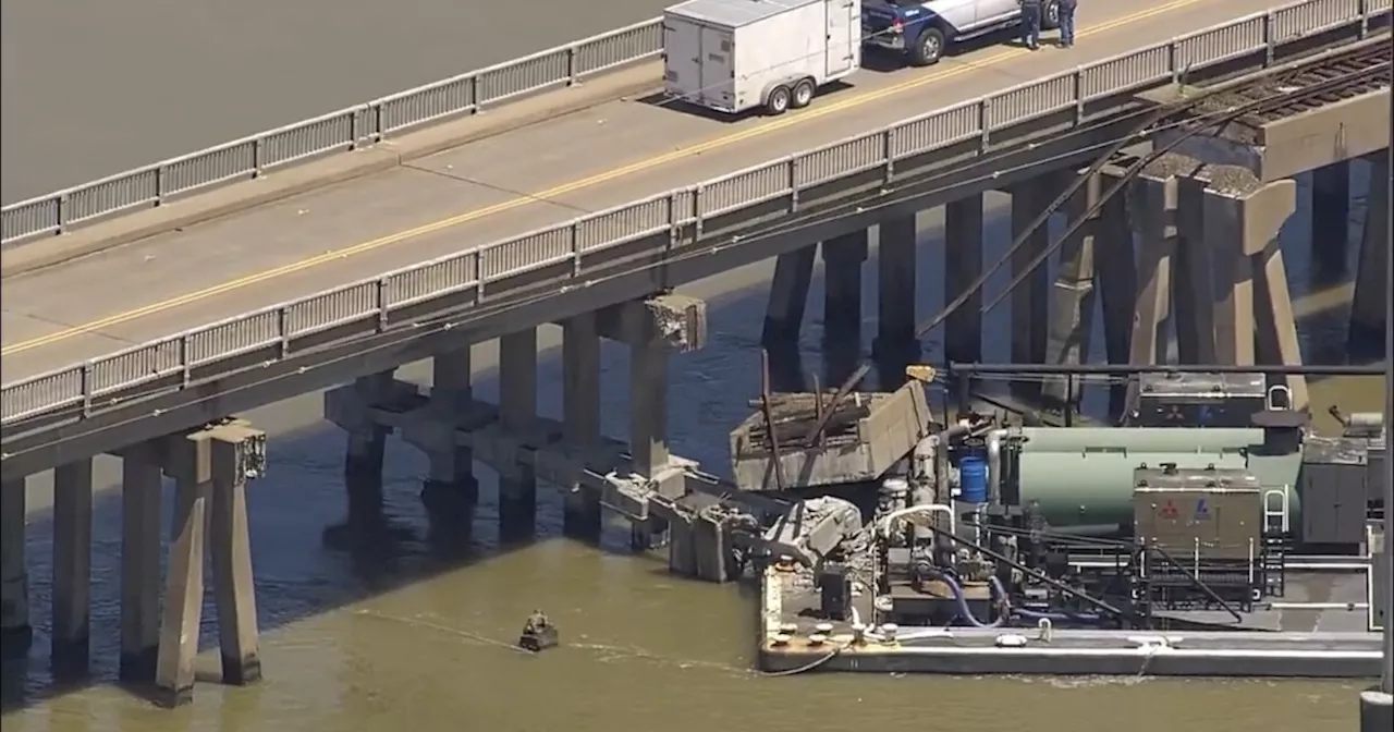 Barge hits Texas bridge connecting Galveston and Pelican Island, causing partial collapse and oil spill