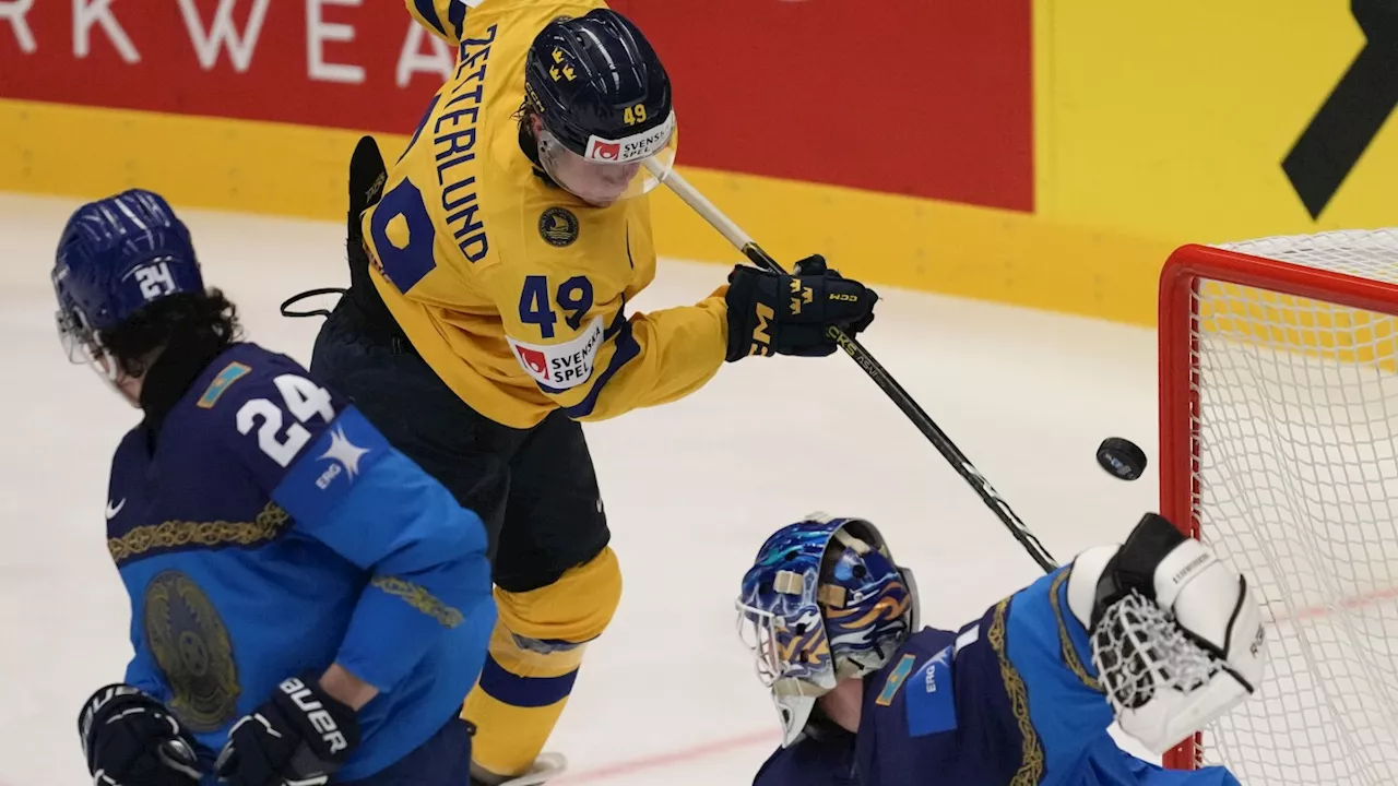 Sweden beats Kazakhstan to keep perfect record at hockey worlds, Austria upsets Finland