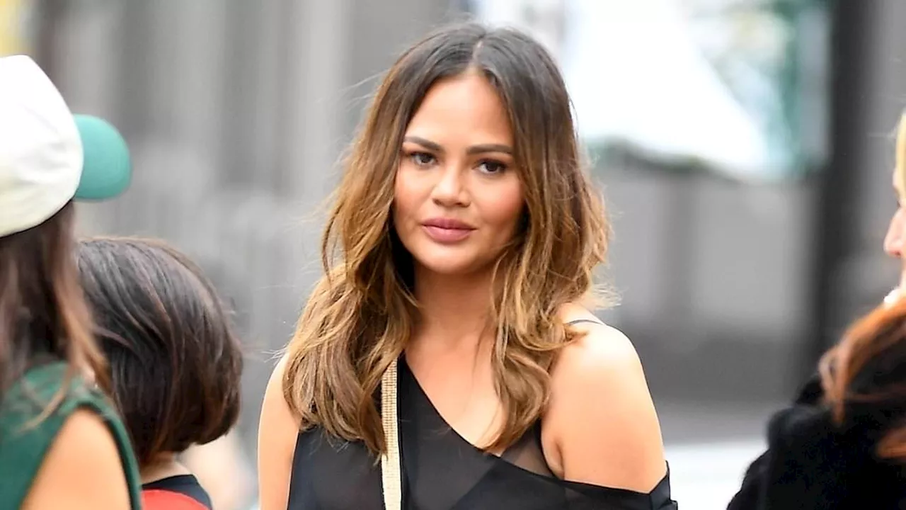 Chrissy Teigen looks stylish as she shops at Gucci after posing for Sports Illustrated cover