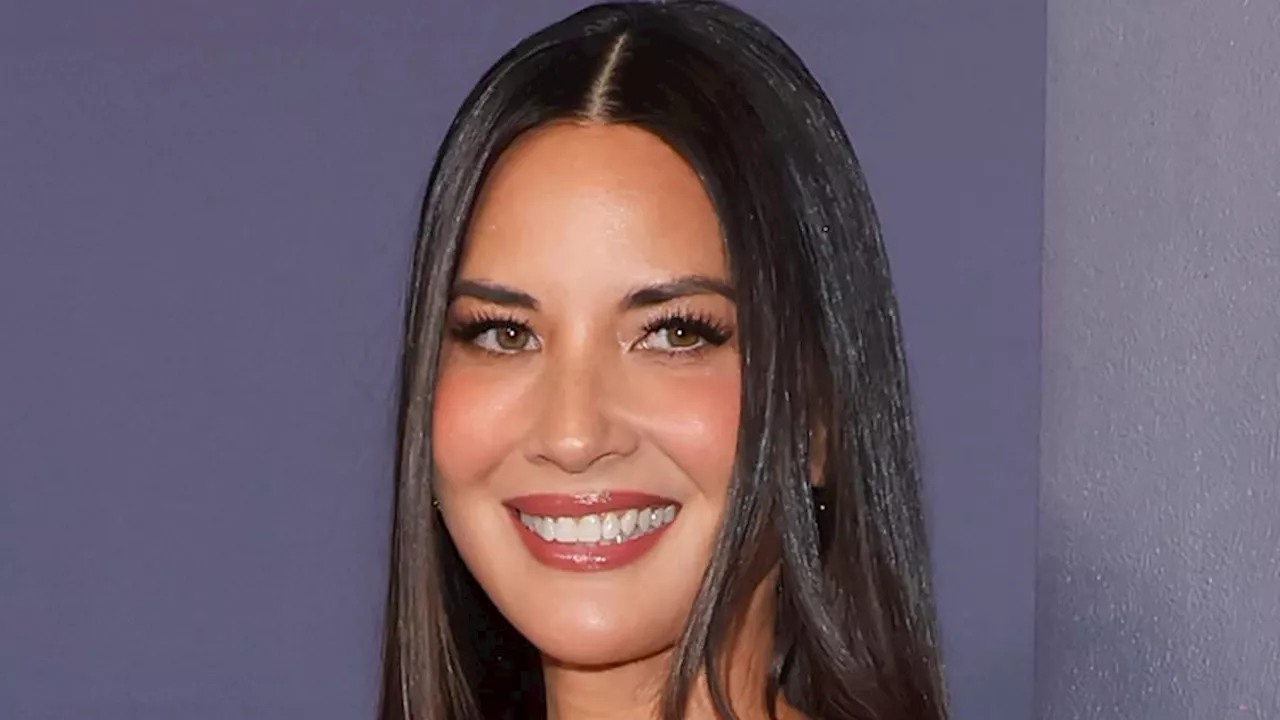 Olivia Munn jokingly says 'goodbye' to 'personal space' as she lets son Malcolm, two, put a finger...