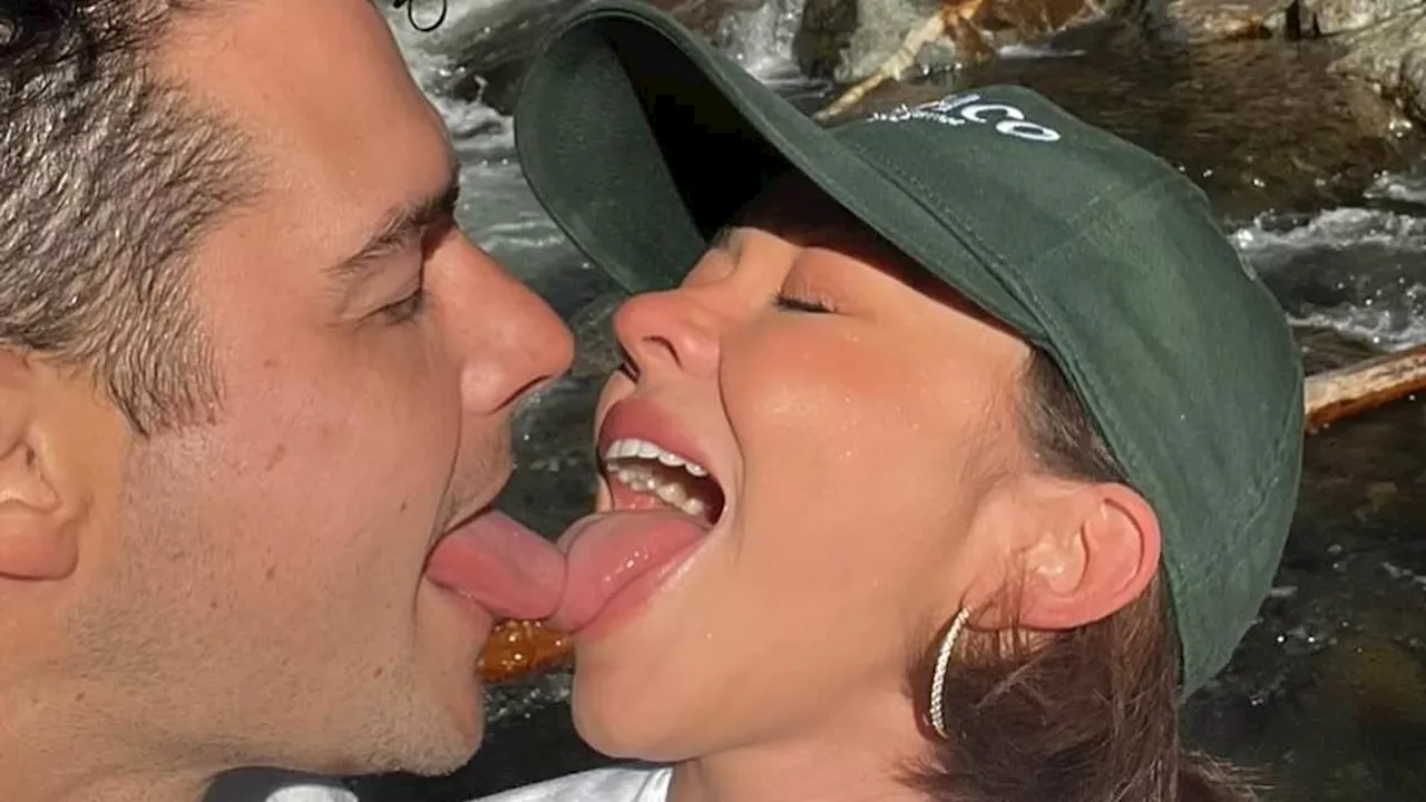 Sarah Hyland LICKS her husband Wells Adams' tongue in loved-up photo album celebrating his 40th...