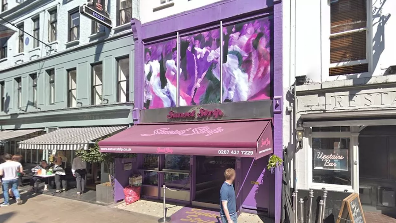 Soho strip club faces having its licence revoked after police found dancers were 'touching'...