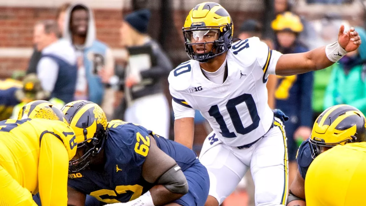 Quarterback uncertainty for rivals Michigan, Ohio State