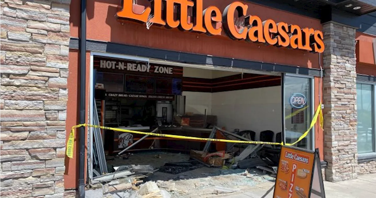 Vehicle crashes through north Calgary pizza restaurant