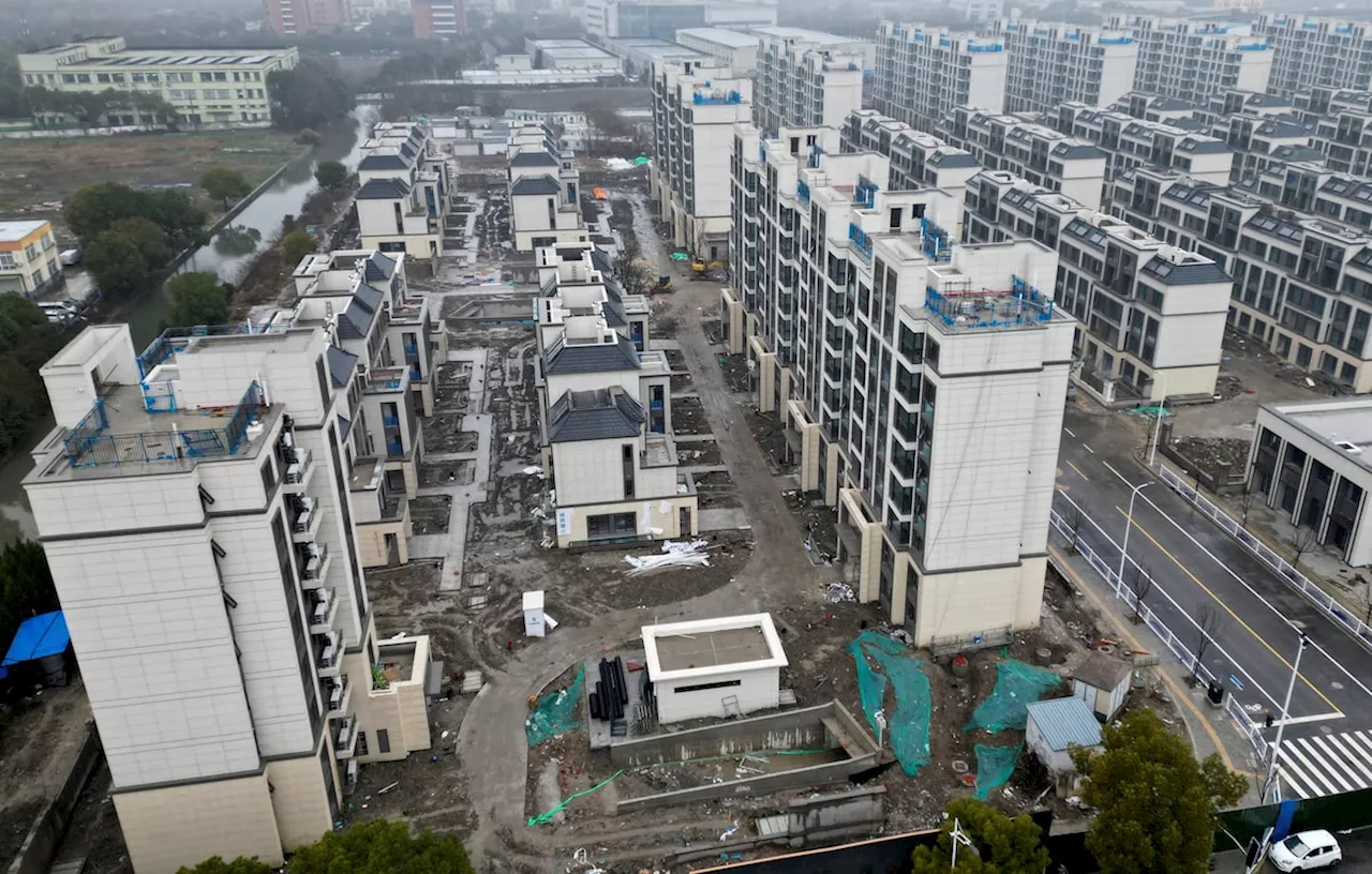 Shares of Chinese property developers rally on report of government plans to buy unsold homes