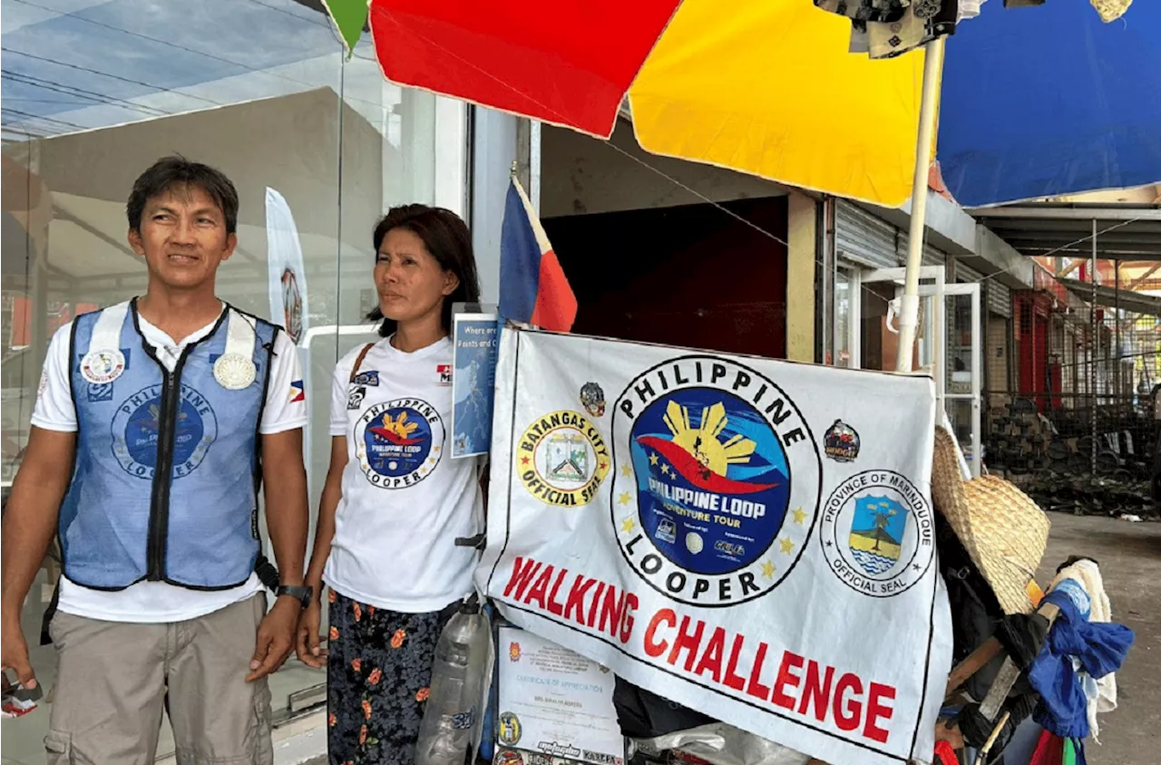 Batangas couple arrives in Naga City after walking for 139 days