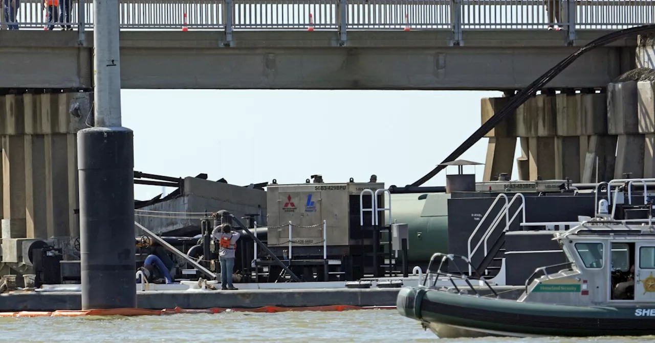 Barge hits bridge connecting Galveston and Pelican Island, causing oil to spill