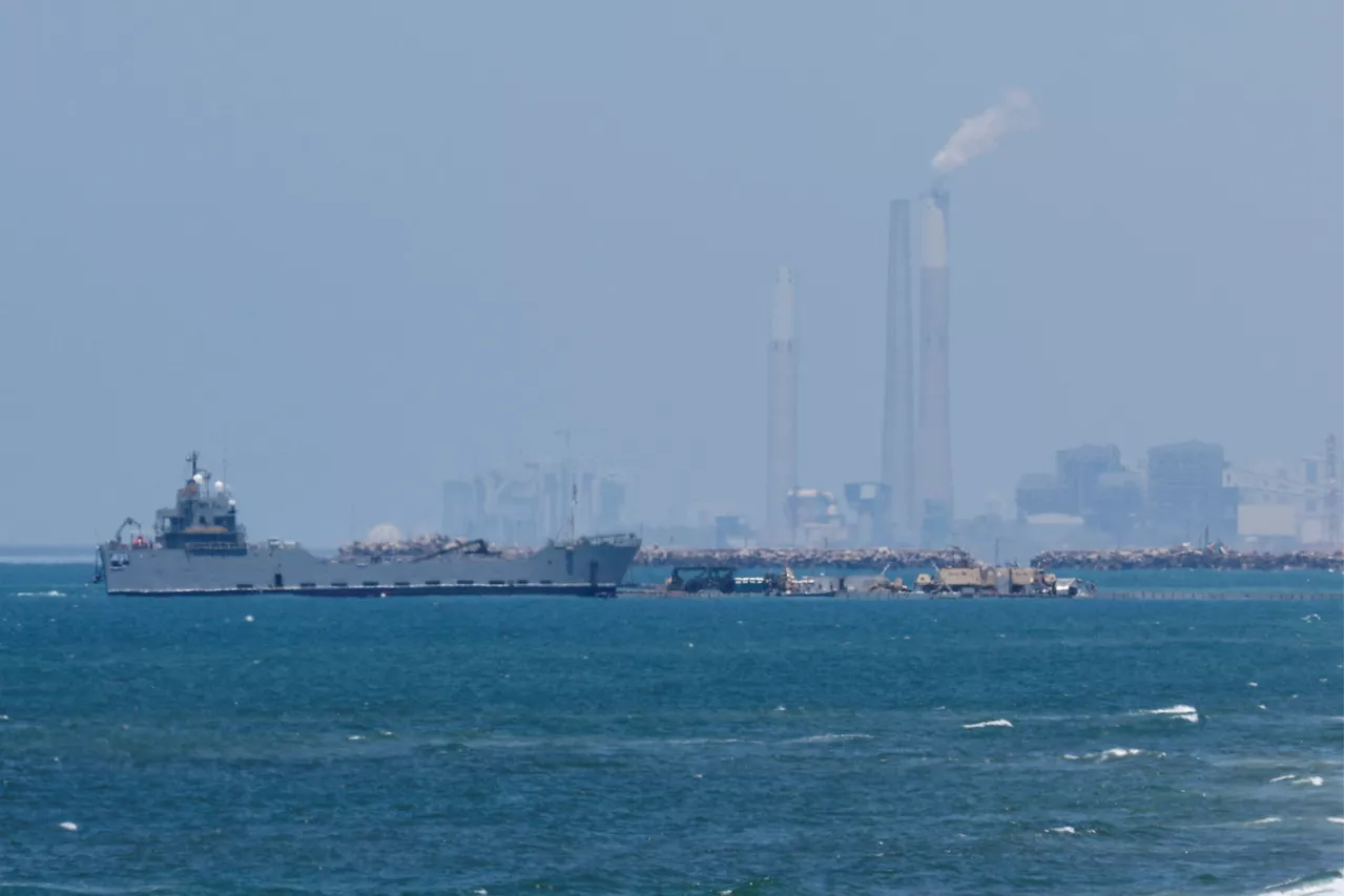 US anchors aid pier to Gaza beach, but distributing aid remains a problem