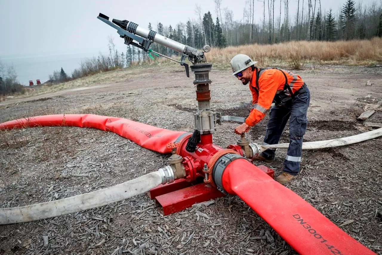 Rain keeping Fort McMurray fire at bay, as thousands out of homes in Western Canada