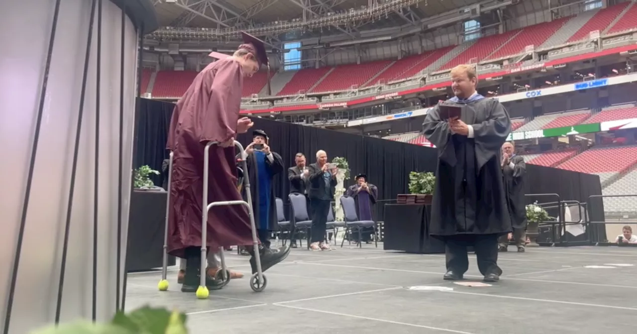 Months after losing his leg, Mountain Ridge High senior walks across the stage at his graduation