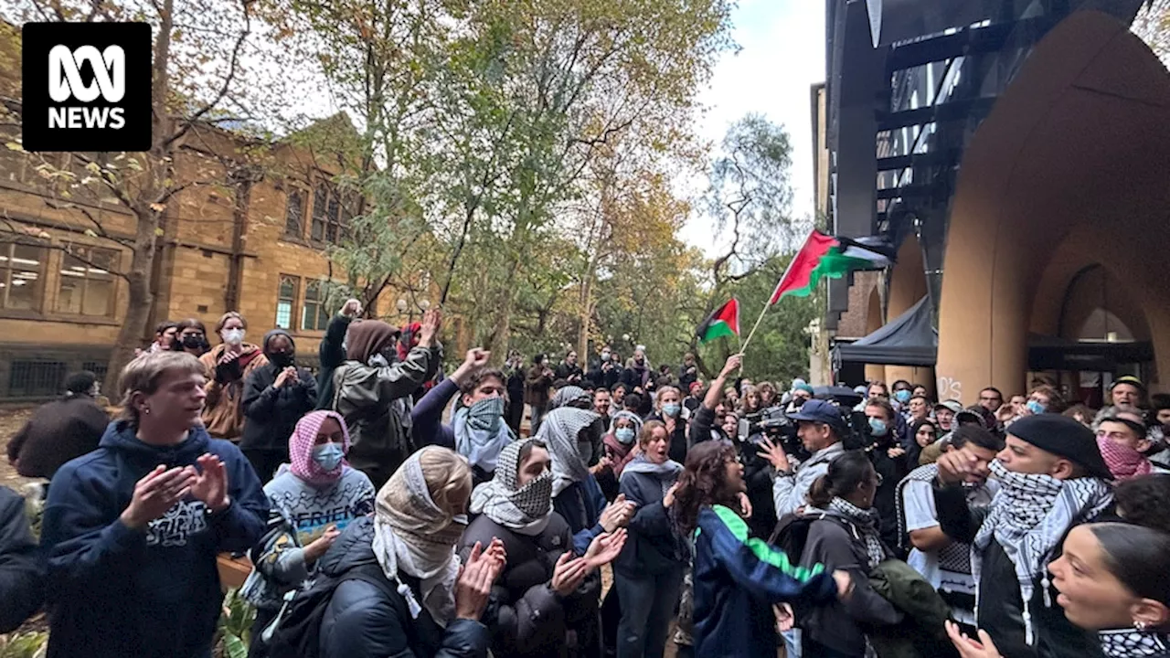 Pro-Palestinian protesters at the University of Melbourne vow to stay, after Monash encampment packs up