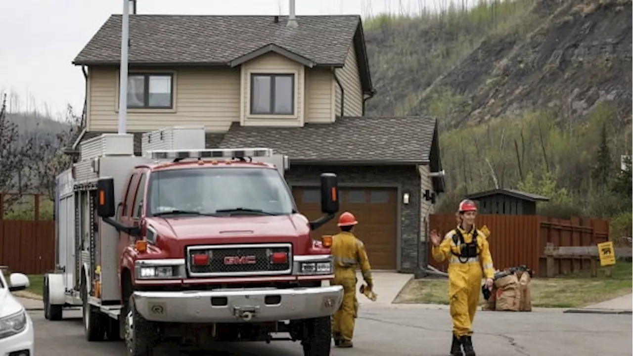 Rain, cooler temperatures reduce wildfire risk in Fort McMurray