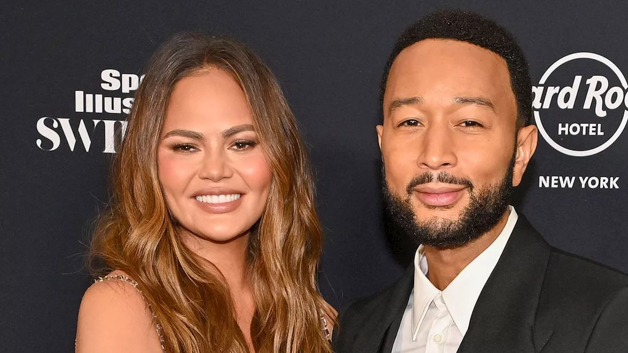 Chrissy Teigen cozies up to John Legend at SI Swimsuit Issue launch